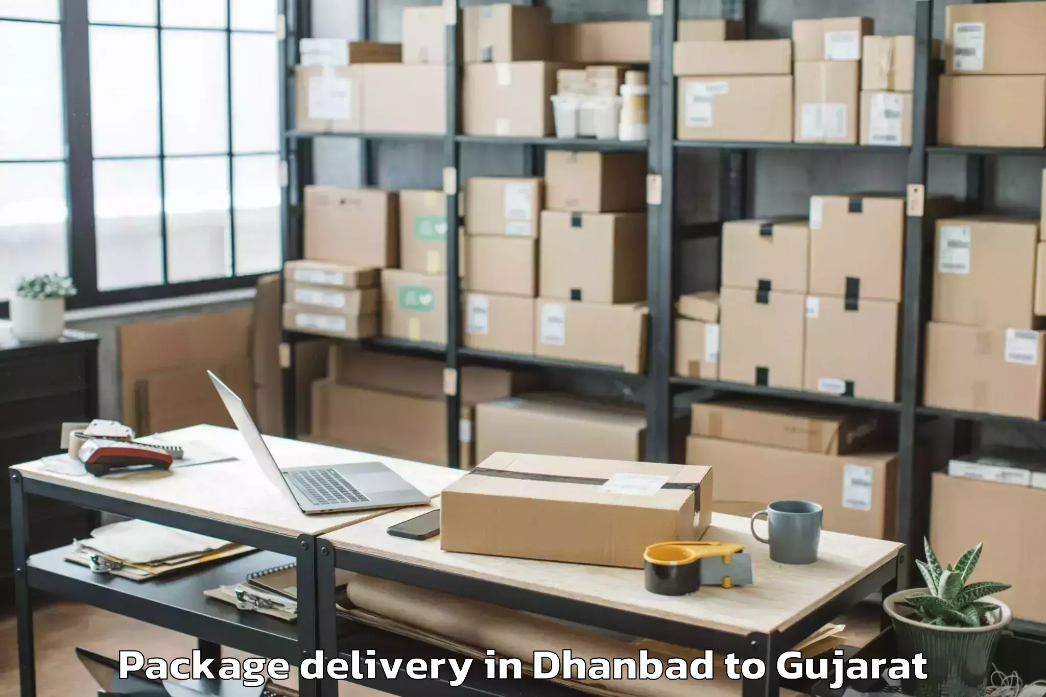 Reliable Dhanbad to Rudra Mata Airport Bhj Package Delivery